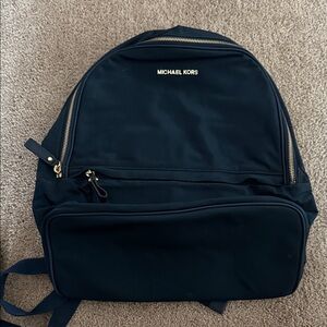 Michael Kors Navy and Gold Backpack